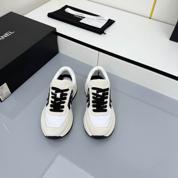 Chanel Black Calfskin & Suede Low Top Logo Sneakers