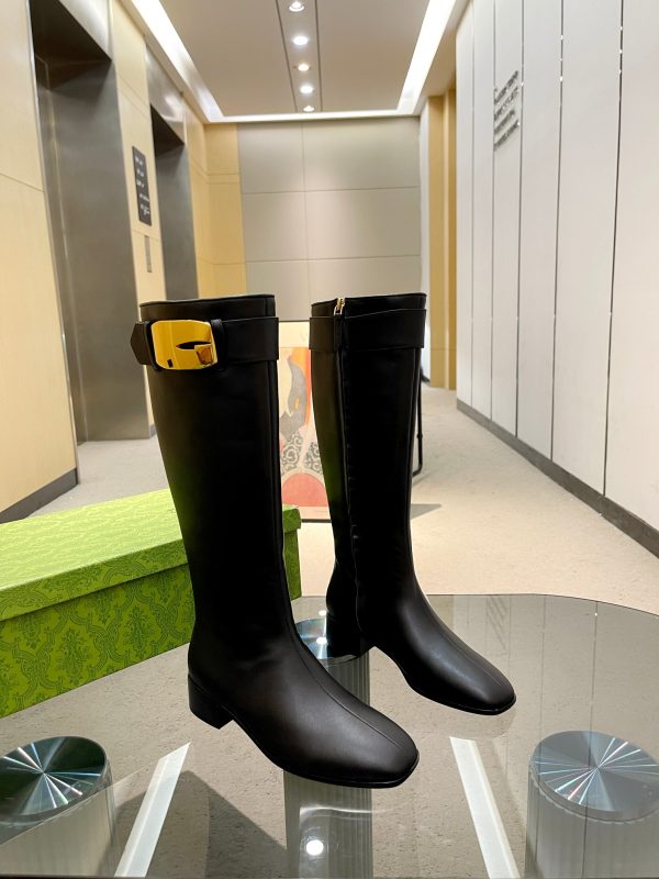 Gucci Knee High Black Boots With Gold Buckle Detail On The Strap