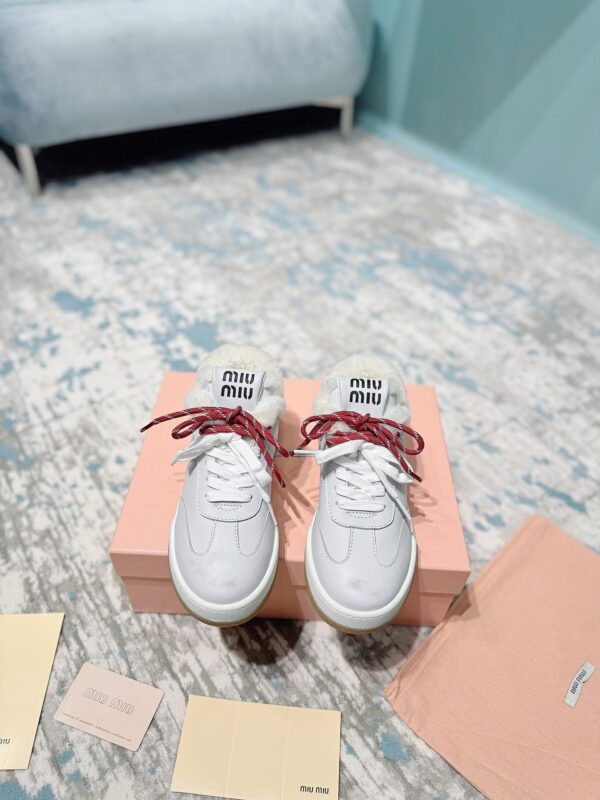 Miu Miu Leather & Shearling Sneakers In Different Colors