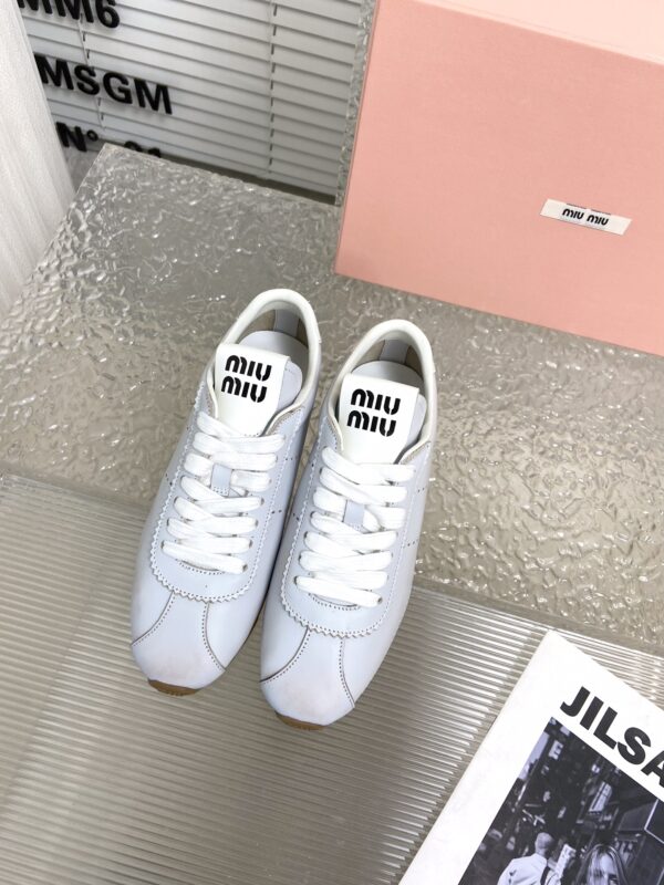 Miu Miu Plume Leather Low Top Sneakers