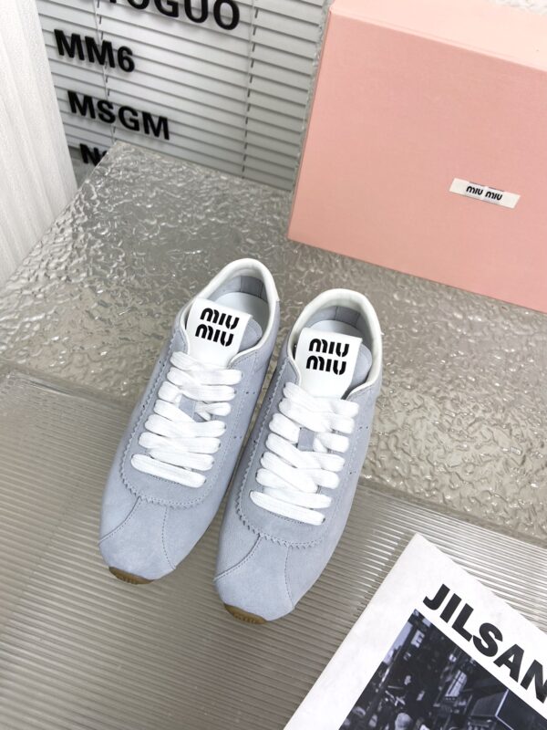 Miu Miu Light Blue Plume Suede Low Top Sneakers