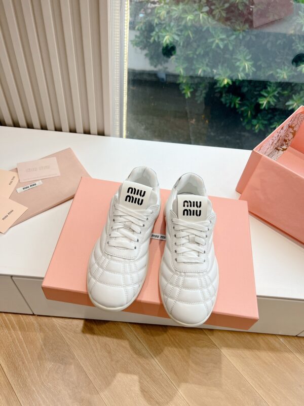 Miu Miu Quilted Leather Low Top Sneakers In 2 Colors