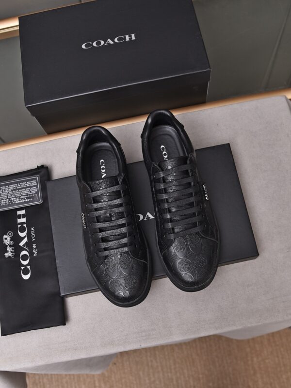 Coach Low Top Sneakers With All Over Embossed Monogram Pattern