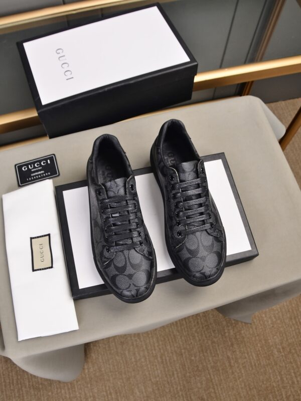 Coach Clip Low Top Sneakers With Brand's Signature Monogram Pattern